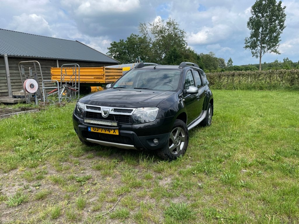 Dacia Duster 1.6 Lauréate 2wd 2012, Auto's, Voorwielaandrijving, Euro 5, Zwart, 4 cilinders