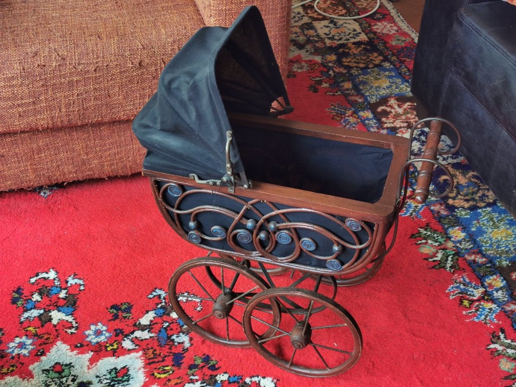 Decoratieve vintage poppenwagen, Ophalen