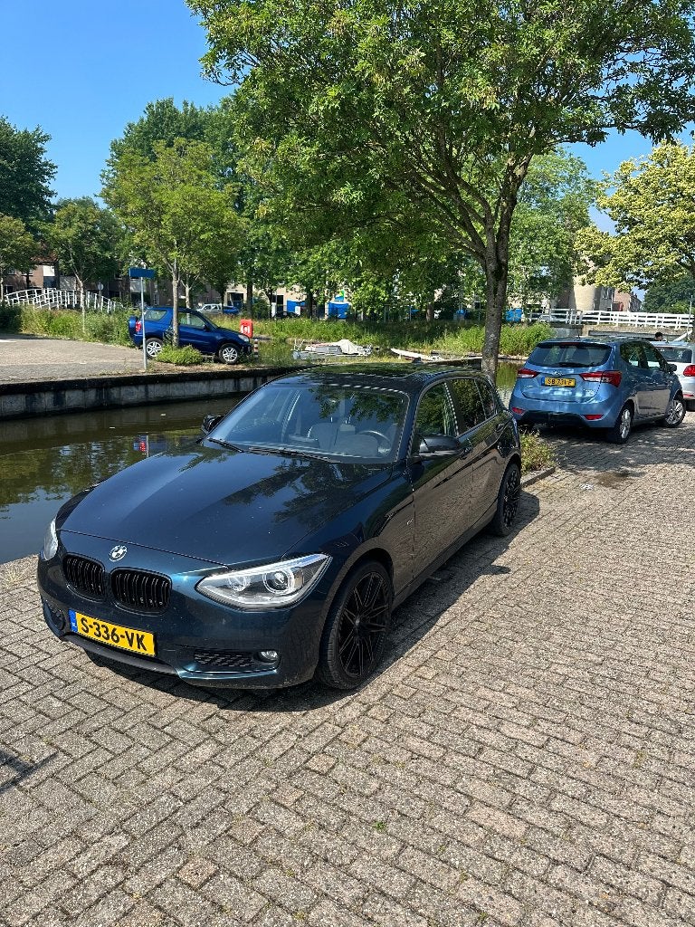 BMW 1-Serie 116I 100KW 5DR 2012 Blauw, Auto's, 1-Serie, Zwart, 4 cilinders, Blauw