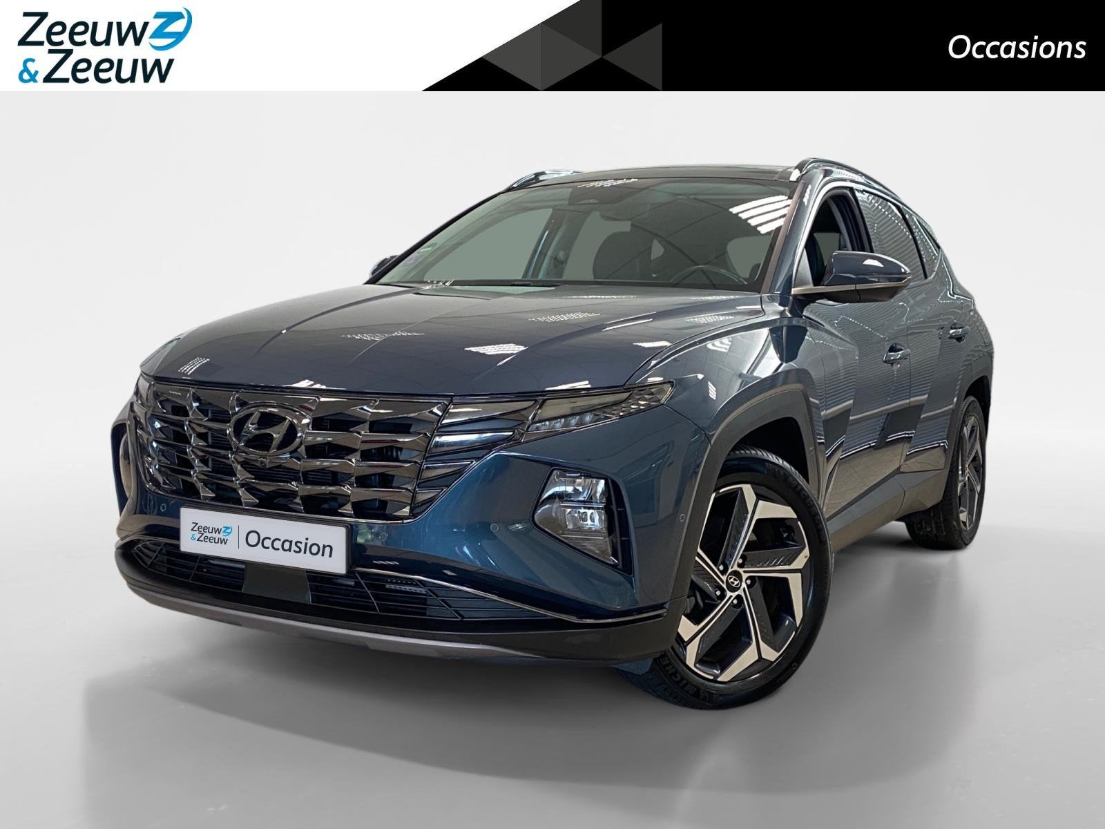 Hyundai Tucson 1.6 HYBRID | PREMIUM SKY | LEDER | 1650KG TRE, Auto's, 12 maanden, Gebruikt, Euro 6, 4 cilinders