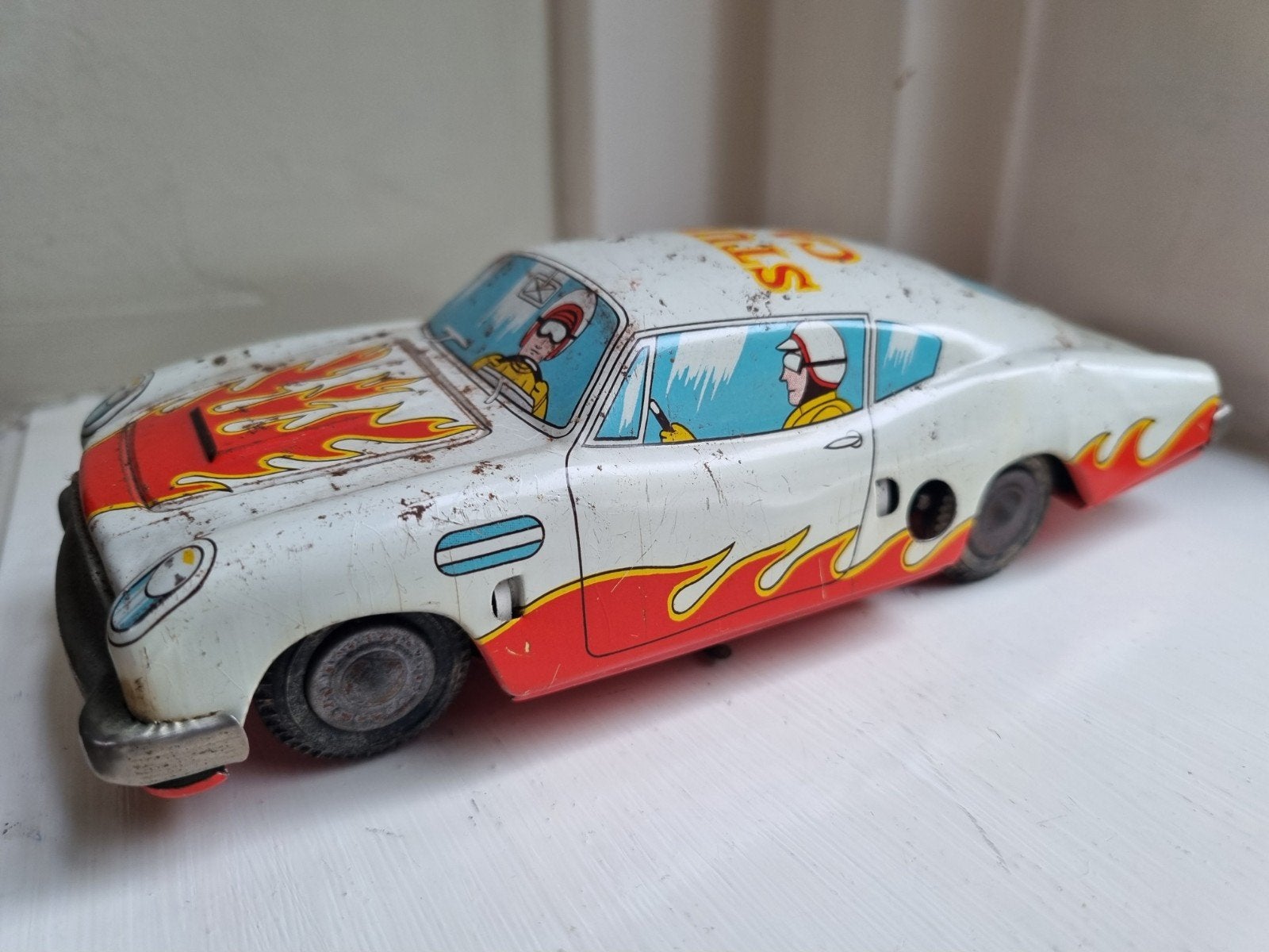 Blikken stunt car 18 cm.
Japan jaren 50., Ophalen