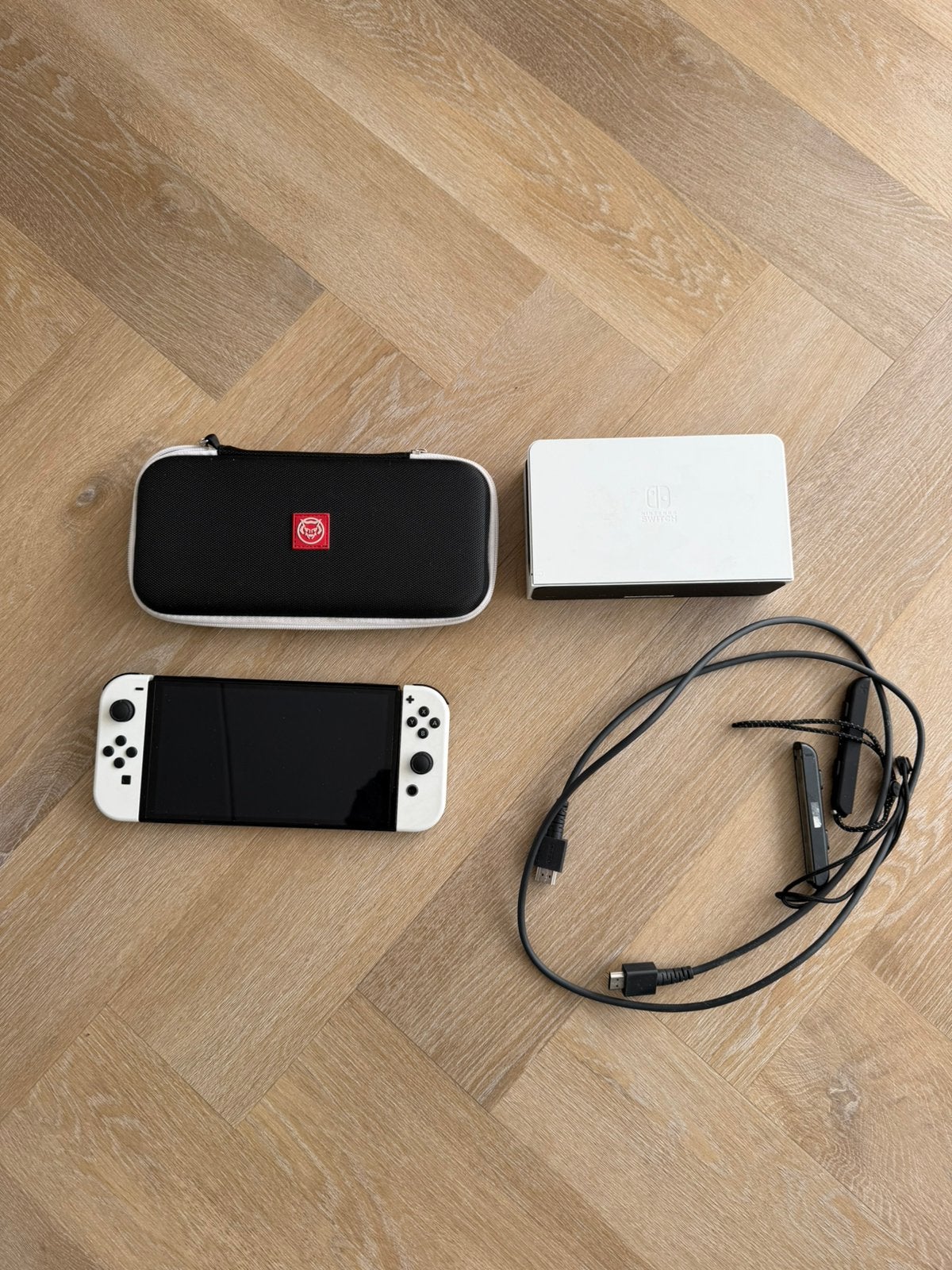 Nintendo switch oled wit krasvrij, Spelcomputers en Games, Ophalen, Zo goed als nieuw