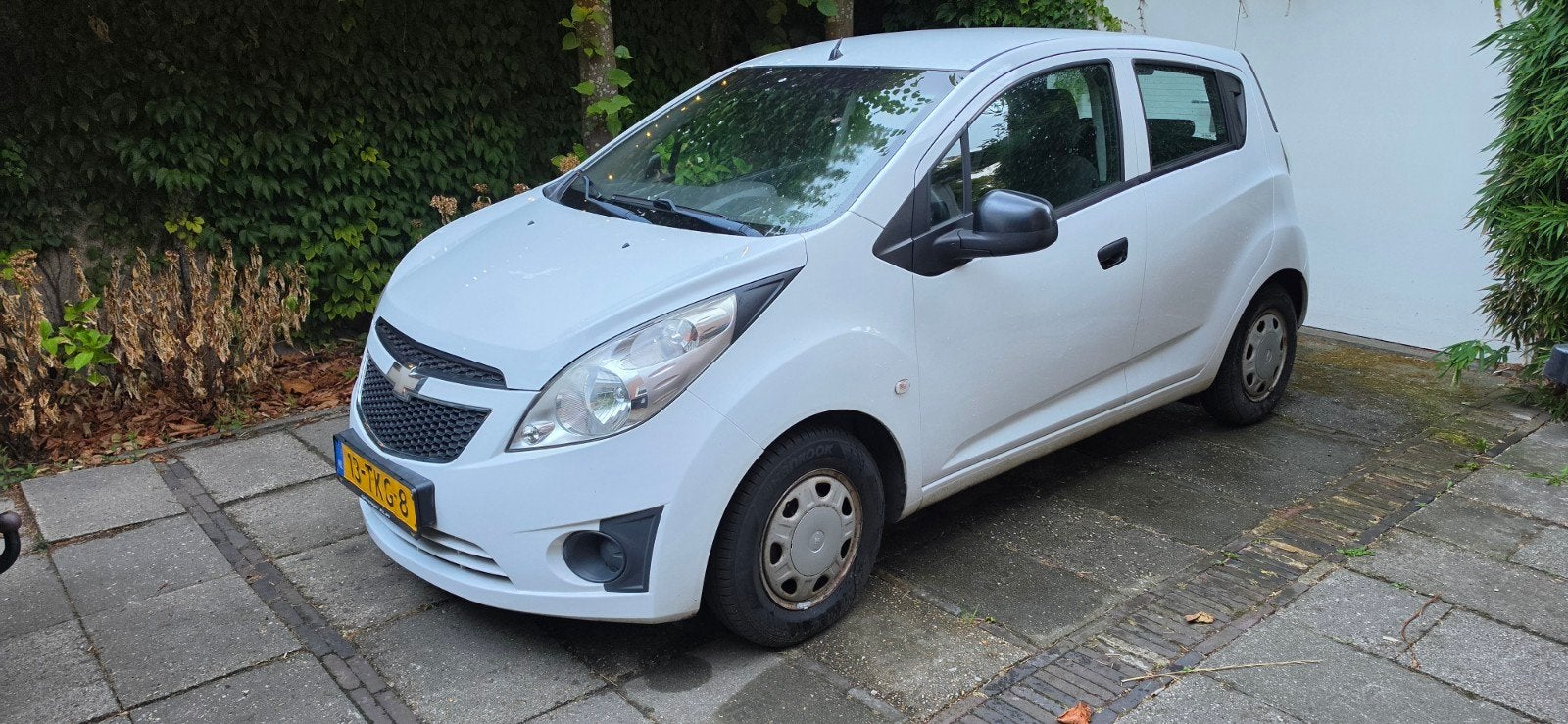 Chevrolet Spark 1.0 Bifuel 2012 Wit, Auto's, 15 km/l, 37 €/maand, 4 cilinders, Wit