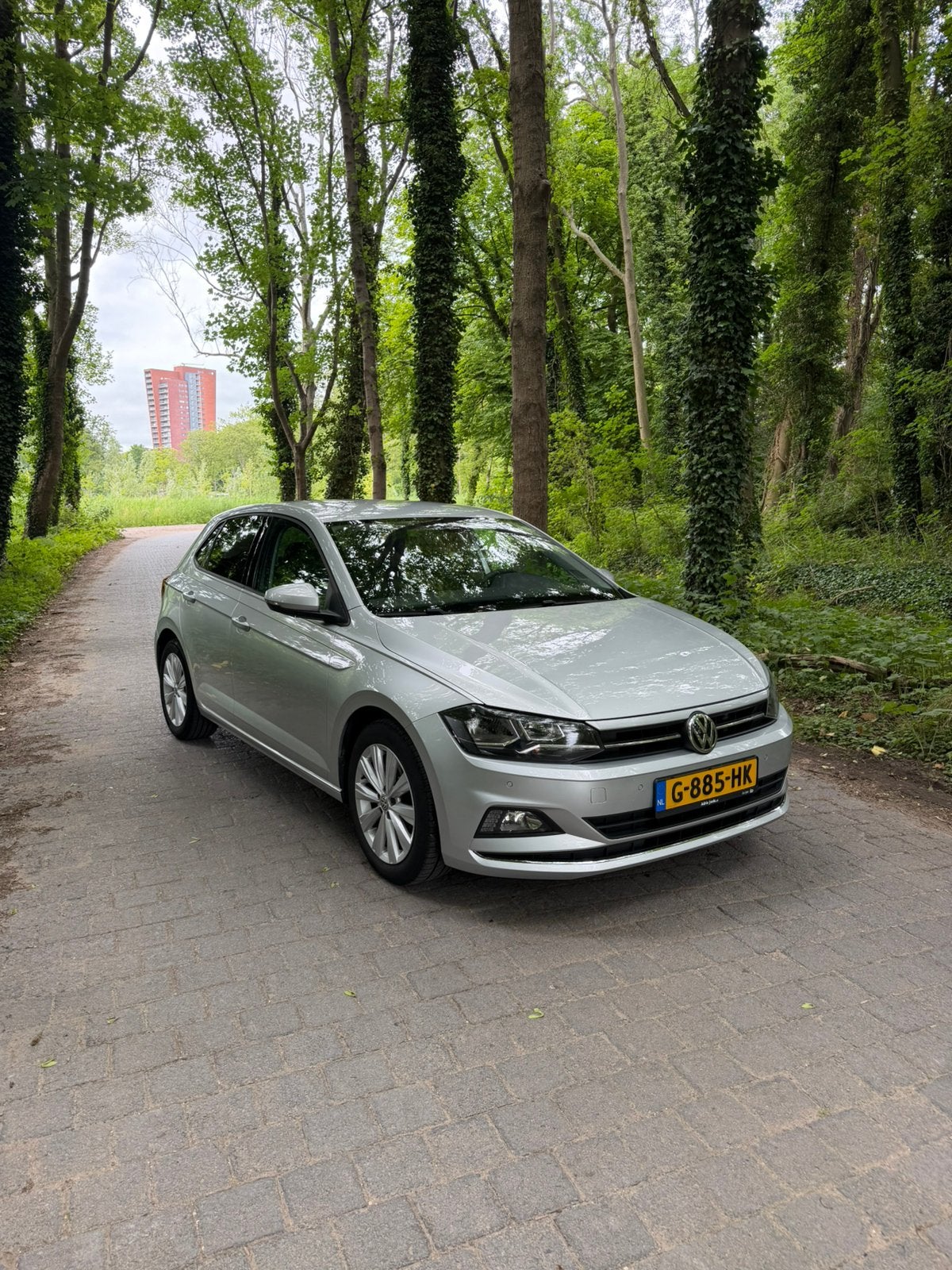 Volkswagen Polo 1.0 TSI high line 116 PK 2019 Grijs, Auto's, Voorwielaandrijving, Stof, 49 €/maand, Origineel Nederlands