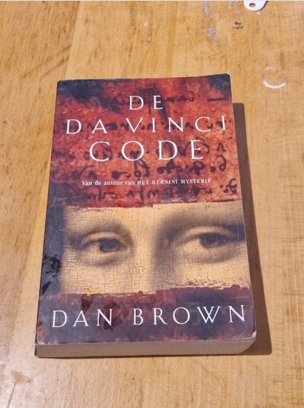 De Da Vinci Code (Nederlands) - Dan Brown, Ophalen of Verzenden, Gelezen