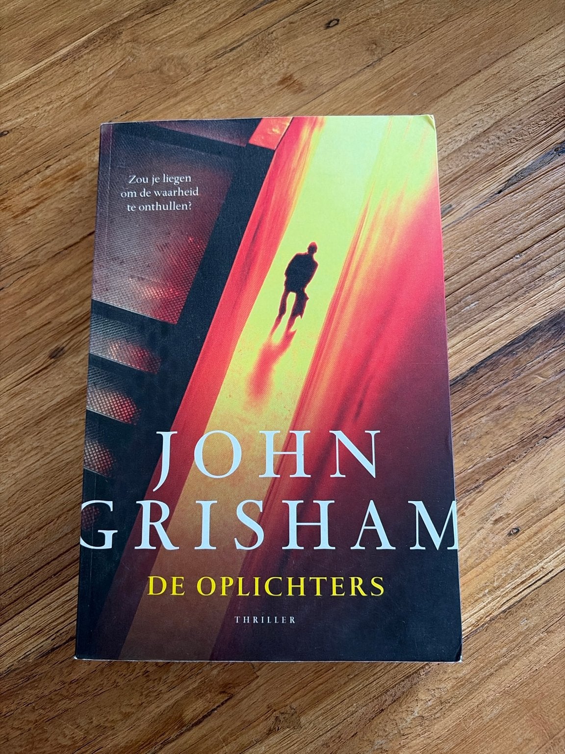 John Grisham - De Oplichters (Thriller), Ophalen of Verzenden, Zo goed als nieuw, Nederland