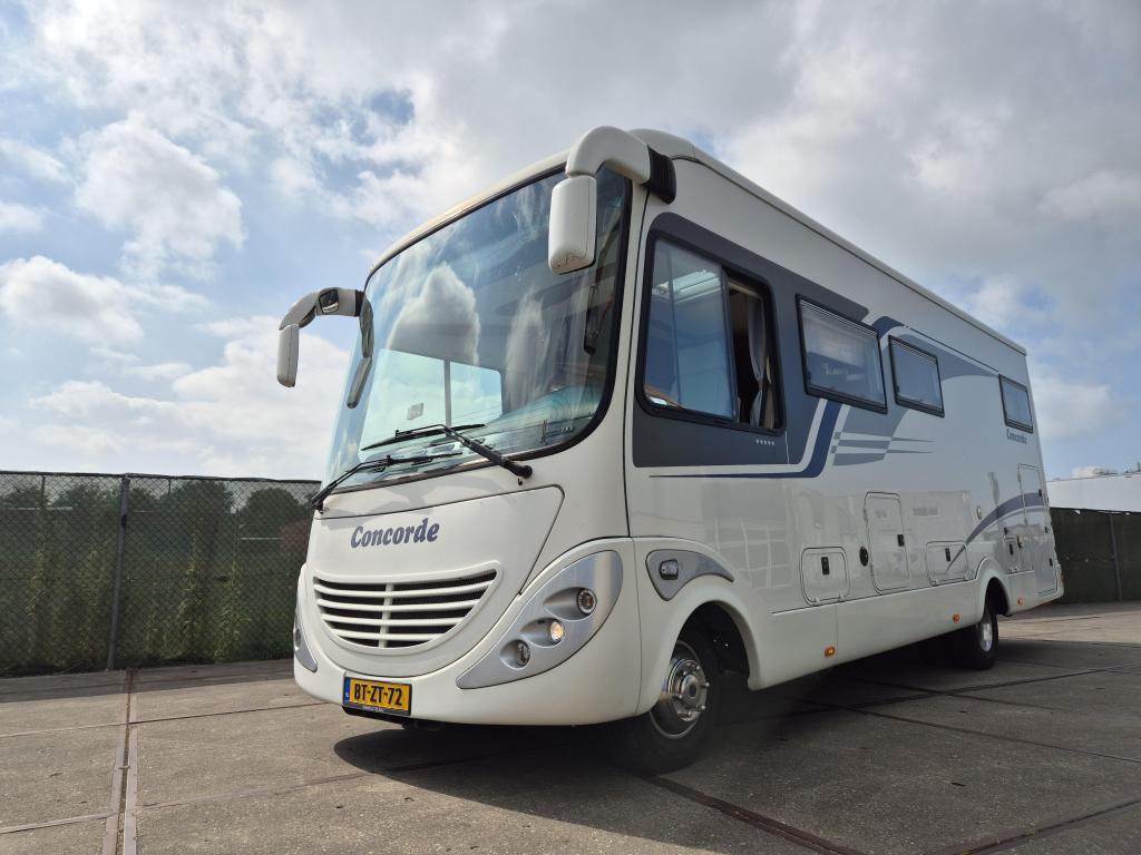 Iveco Concorde Charisma l-790H integraal Hefbed, Caravans en Kamperen, Bedrijf, Koelkast, Overige merken, Cassettetoilet