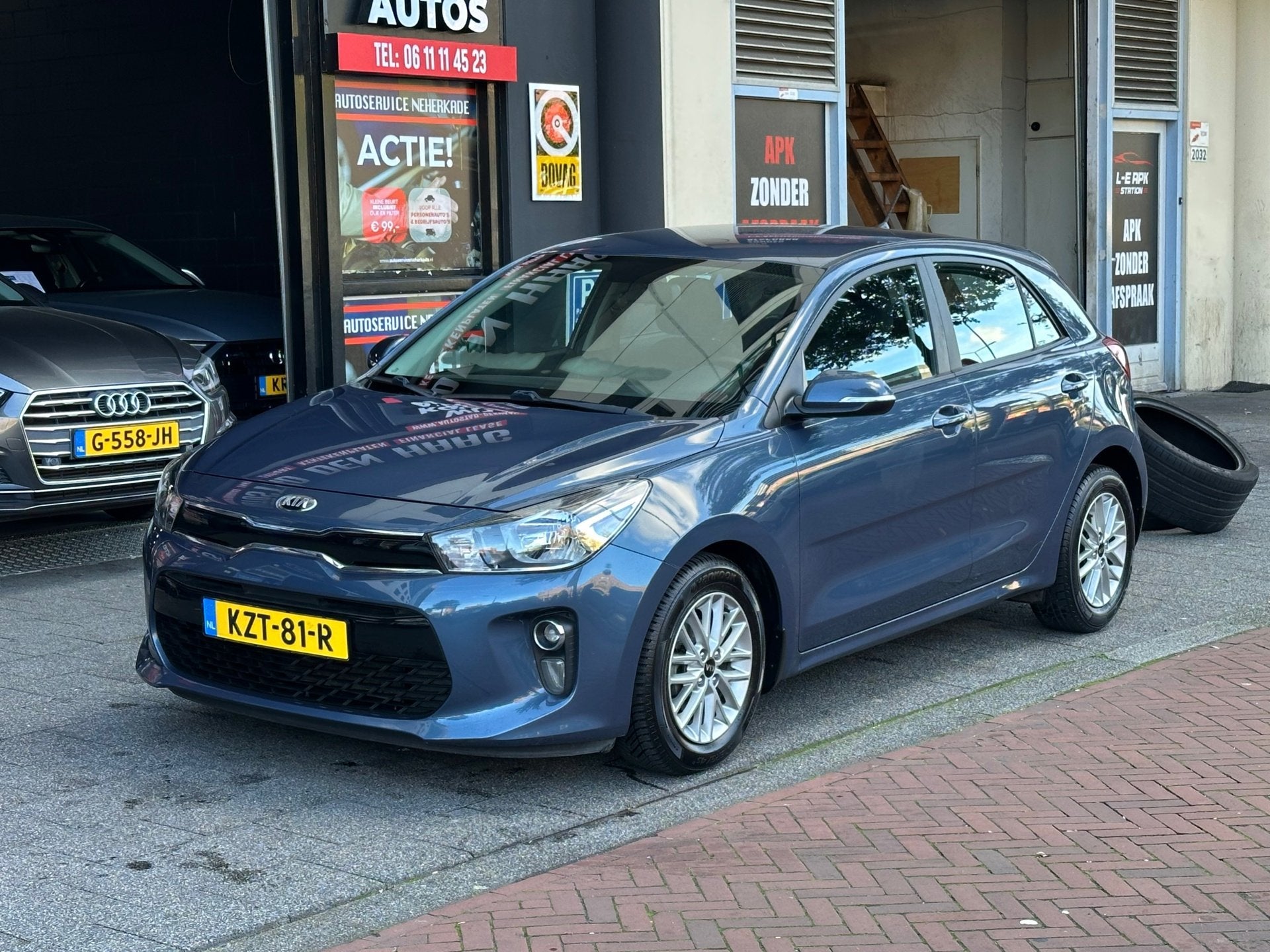 Kia Rio 1.4 DynamicLine Automaat 5 Deurs Airco, Auto's, Gebruikt, Euro 6, 4 cilinders, Blauw