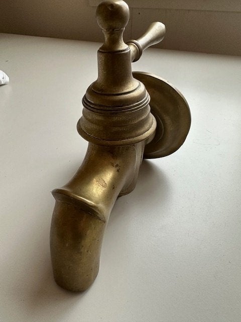 antieke messing kraan, Ophalen