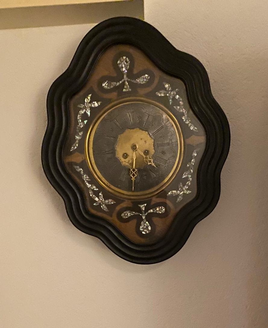 Wandklok Oeil de boeuf, Ophalen