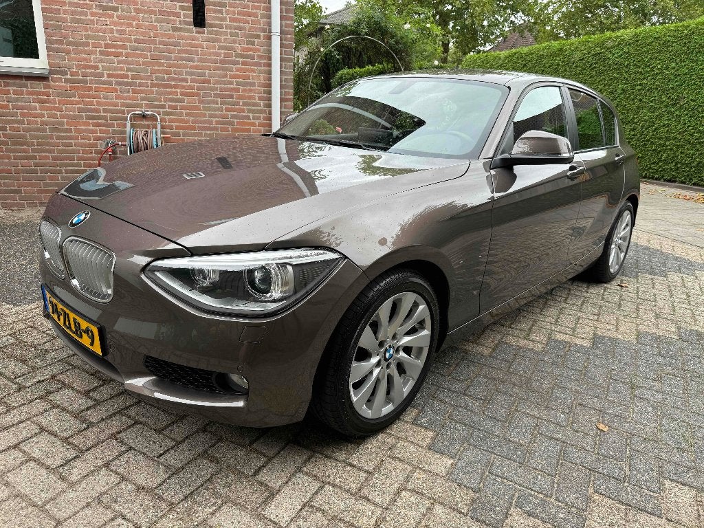BMW 116d High Executive 2013 171.786 km CarPlay Leder Xenon, Auto's, BMW, 1-Serie, Euro 5, Achterwielaandrijving, Zwart