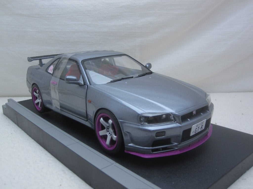 Nissan Skyline R34 GTR 1999 Grijs / paars 1:18 Solido, Hobby en Vrije tijd, Modelauto's | 1:18, Ophalen of Verzenden, Nieuw, Auto