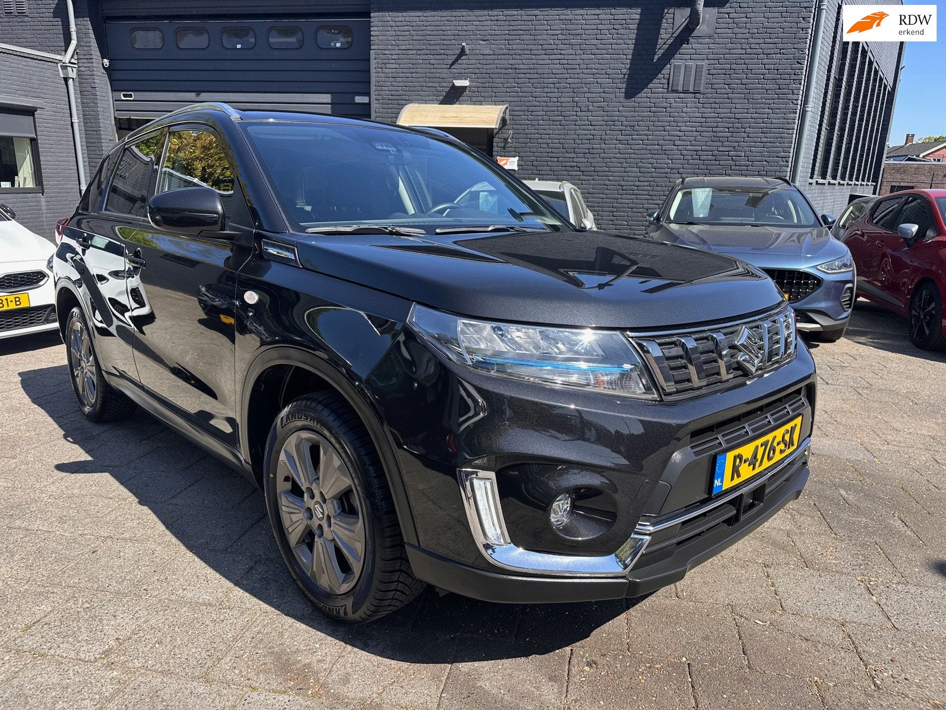 Suzuki Vitara 1.5 Hybrid 116pk|Aut|Navi|Camera|Key-Less, Auto's, Suzuki, Gebruikt, 4 cilinders, 400 kg, Zwart