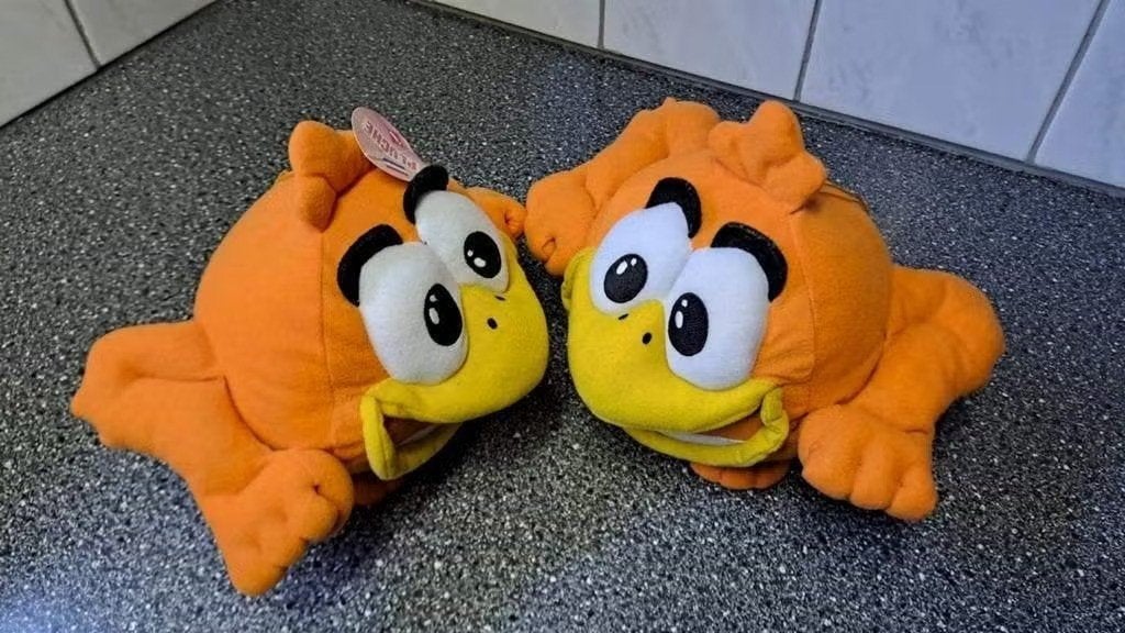 2x Oranje c1000 geluksvogel knuffel, Oranje, Overige typen, Onbekend, Ophalen of Verzenden