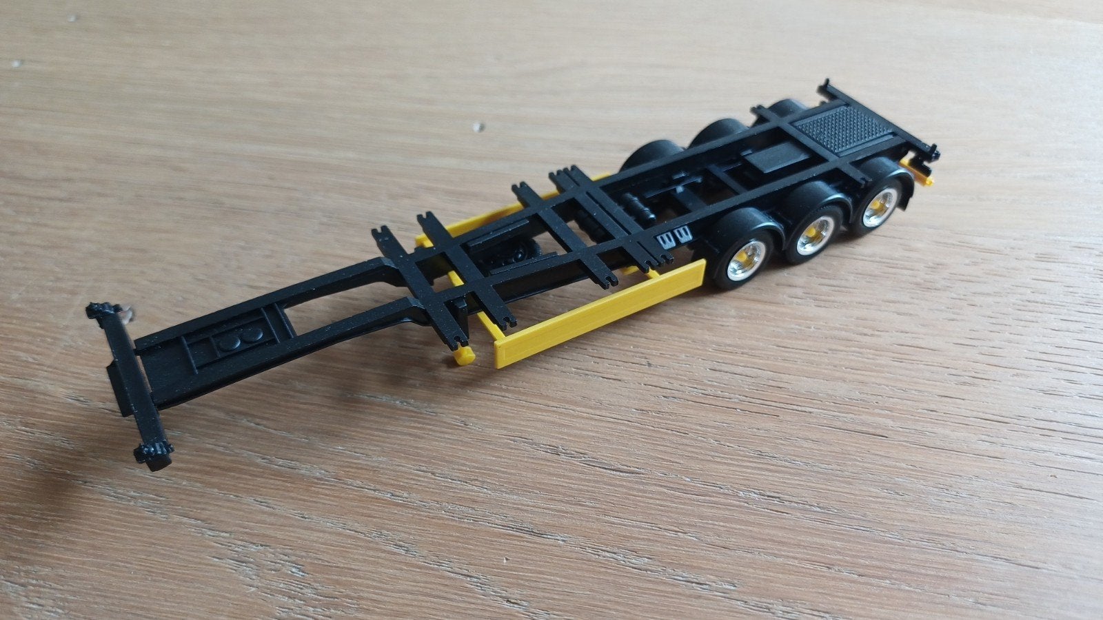 Herpa container trailer chassis zwart / geel, Hobby en Vrije tijd, Modelauto's | 1:87, Ophalen of Verzenden, Nieuw, Bus of Vrachtwagen