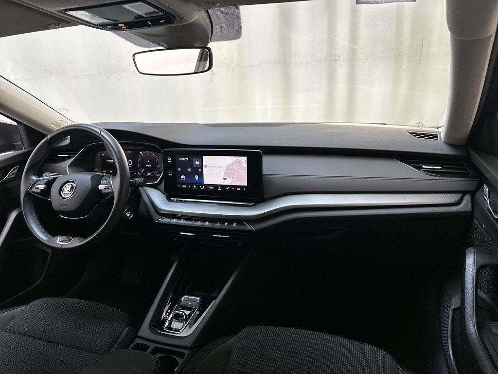 Skoda Octavia Combi 1.4 TSI iV PHEV Business Edition Camera, Auto's, Skoda, Stof, Gebruikt, 4 cilinders, Plug-in hybride
