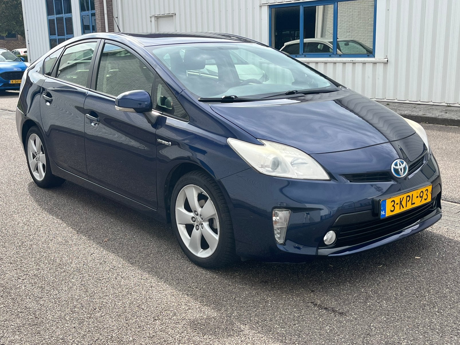 Toyota Prius 1.8 Full Hybrid Business | camera | 2e eigenaar, Auto's, 4 cilinders, Blauw, Leder en Stof, Origineel Nederlands