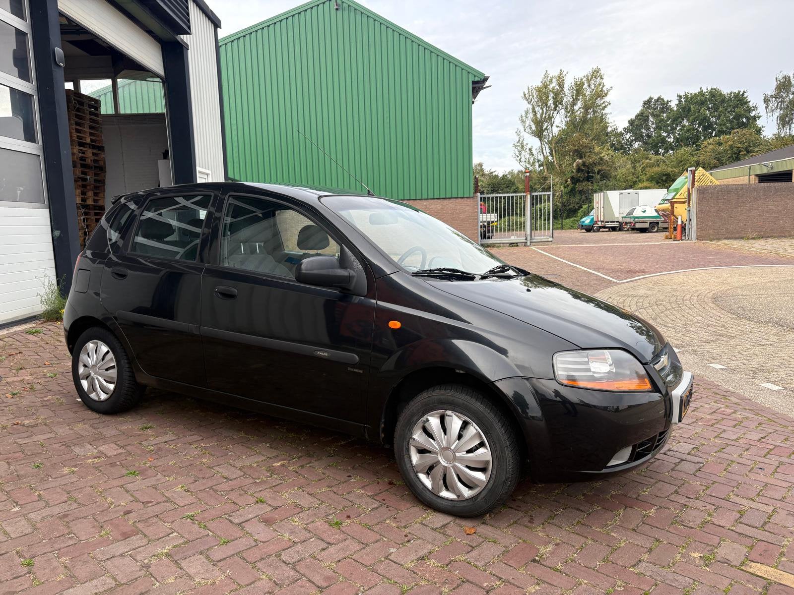Chevrolet Kalos 1.4 2005 Zwart, Auto's, 83 pk, Stof, 40 €/maand, 4 cilinders