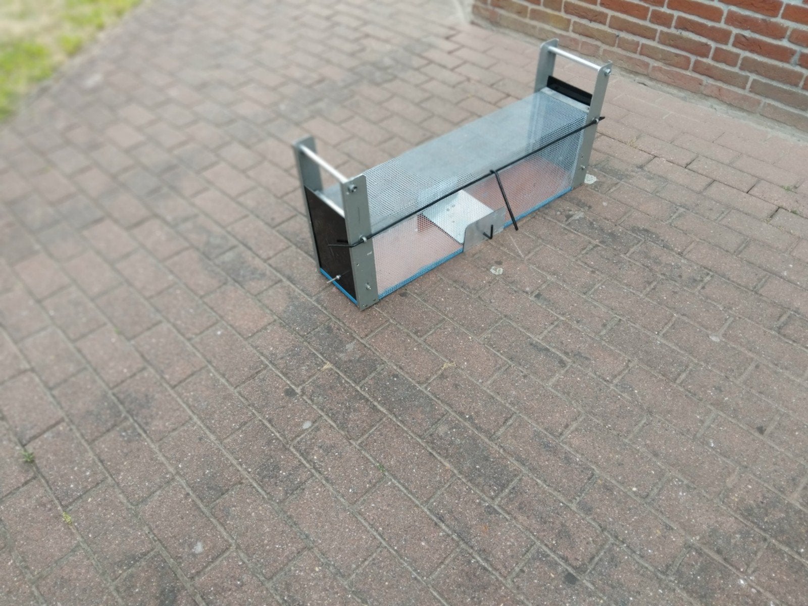 Te koop mooie vangkooi, Ophalen