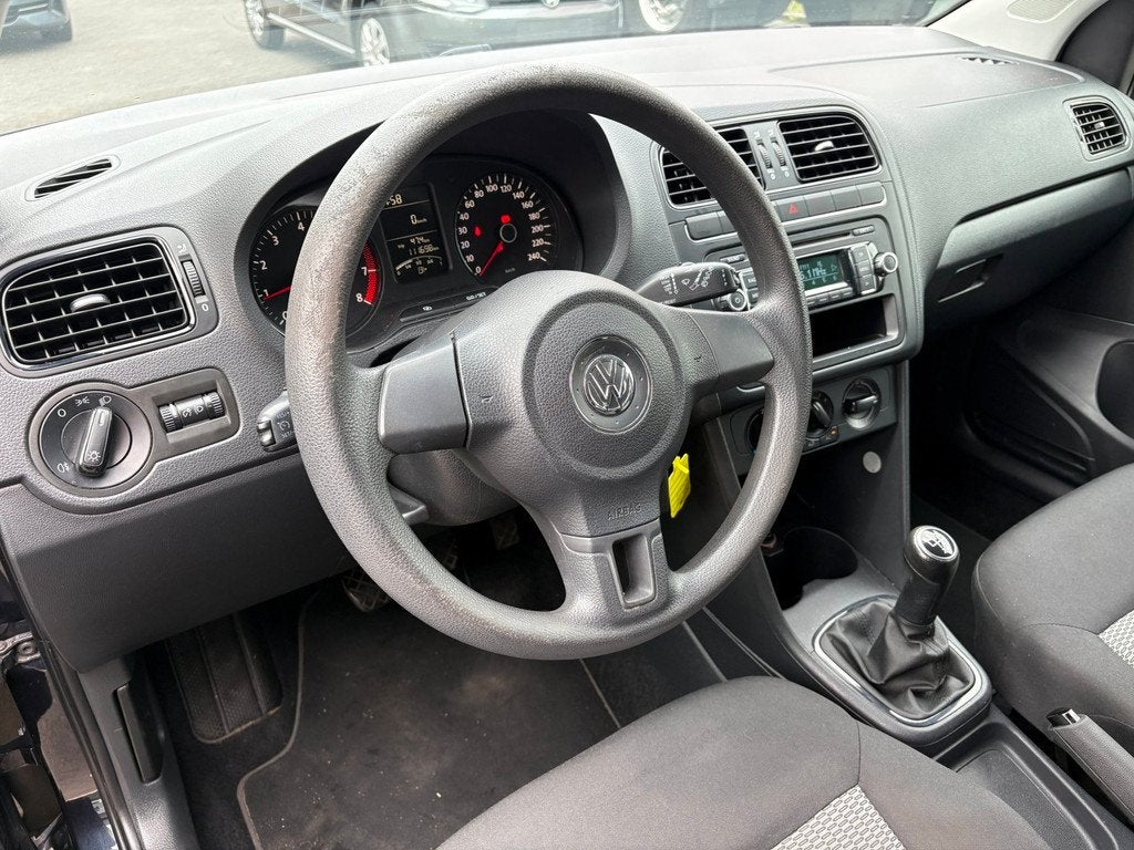 Volkswagen Polo 1.2 NWE KETTING/PARKEERSENSOREN/AIRCO/CRUISE, Auto's, Volkswagen, Voorwielaandrijving, Stof, Gebruikt, Zwart