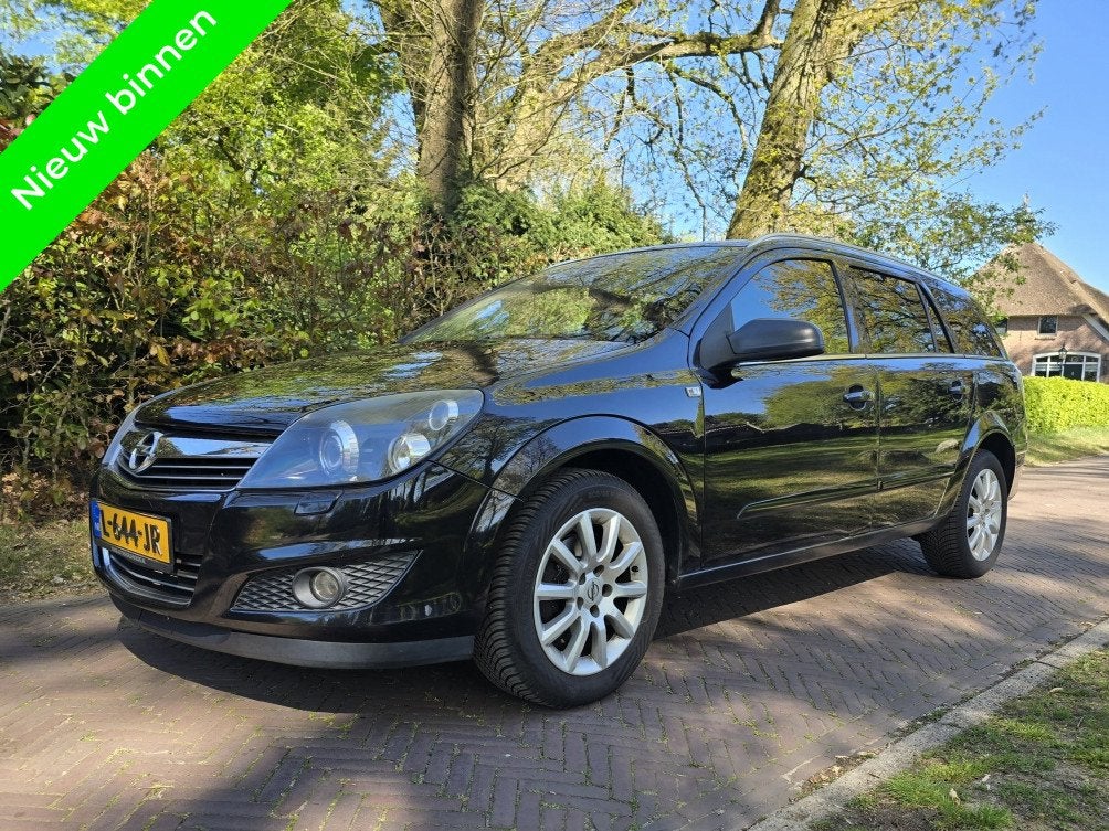 Opel Astra Wagon 1.8 Cosmo (bj 2009), Voorwielaandrijving, Gebruikt, Zwart, 14 km/l