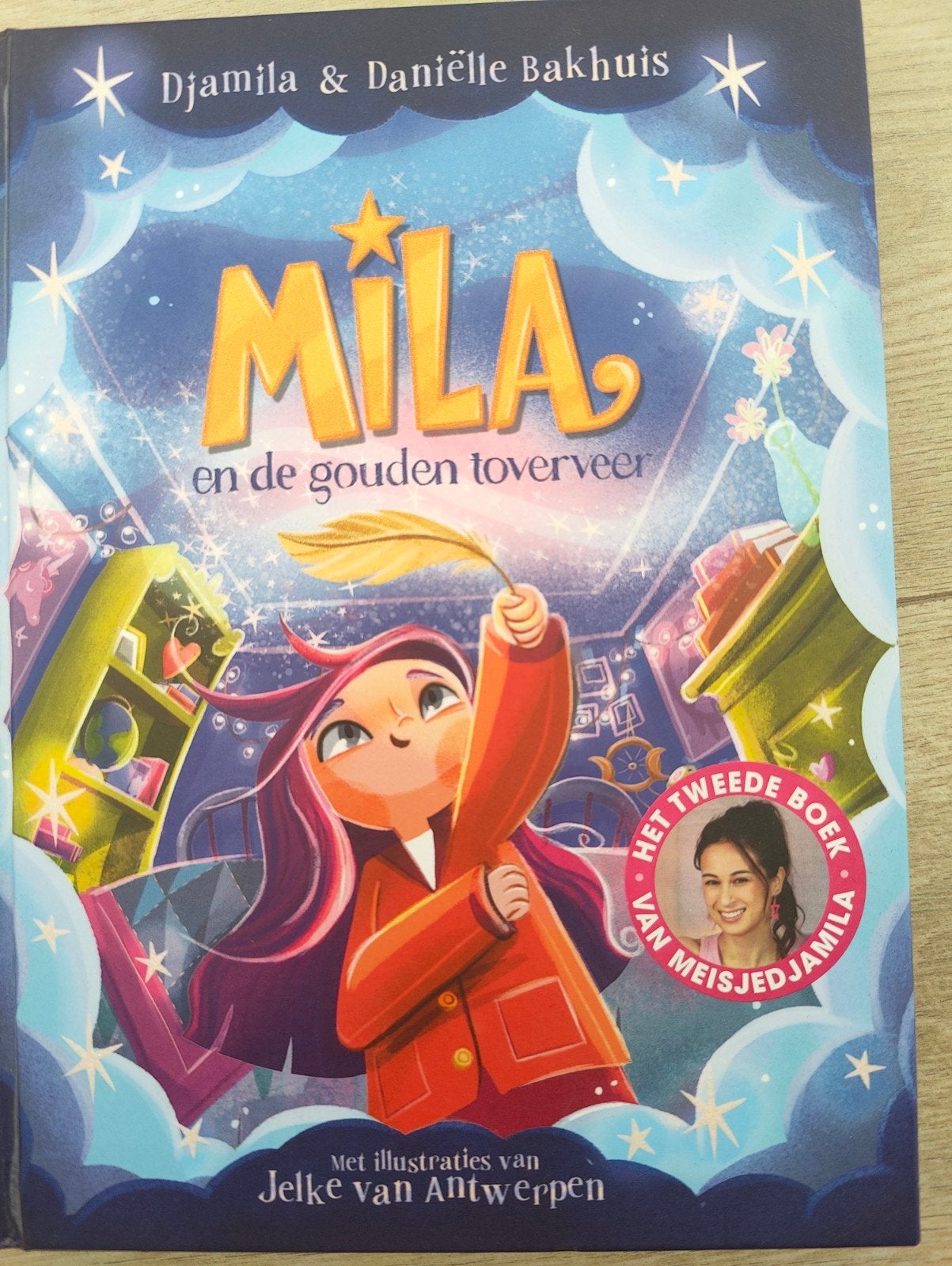 Mila en de gouden toverveer, Boeken, Ophalen