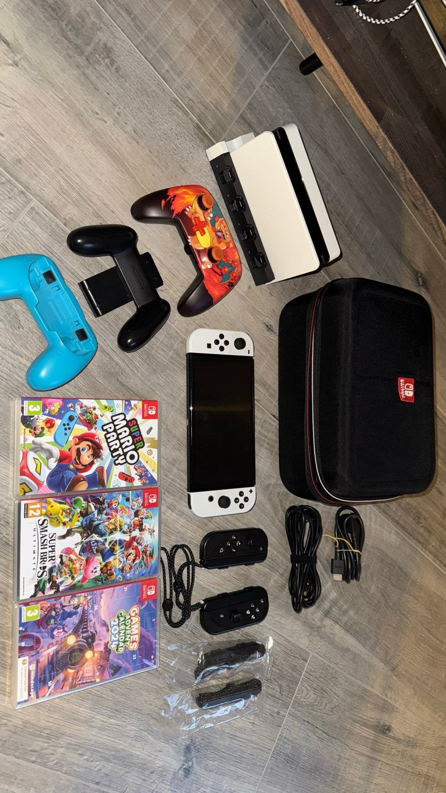 Nintendo Switch OLED met 3 games en extra controllers +128GB, Spelcomputers en Games, Spelcomputers | Nintendo Switch, Zo goed als nieuw