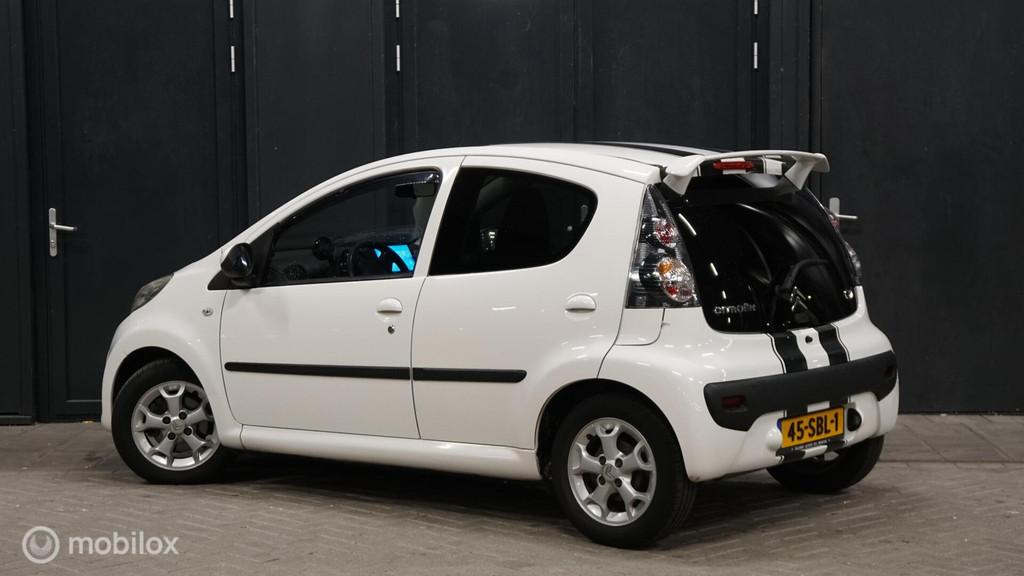 Citroen C1 1.0-12V Exclusive AUT|schuifdak|carplay|airco|apk, Euro 5, Gebruikt, 4 stoelen, C1