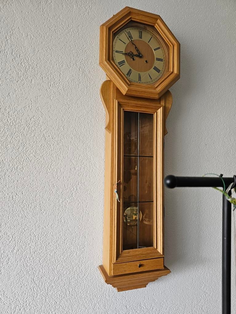 Wand klok, Ophalen