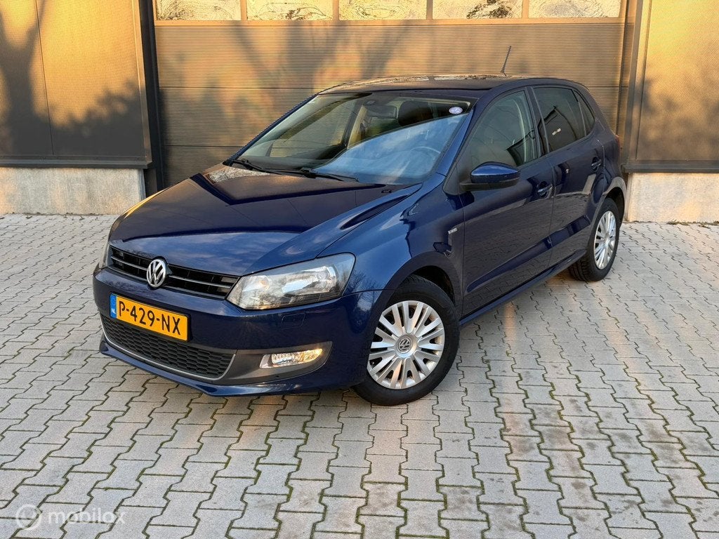 Volkswagen Polo 1.2 Comfortl Apple Car Stoelver Clima Cruise, Auto's, Volkswagen, Euro 5, Zwart, Blauw, 1198 cc