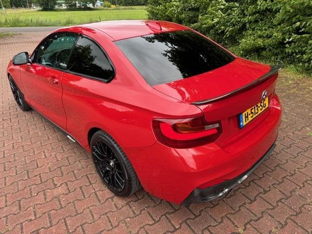 BMW 2 Serie Coupé M235i HIGH EXECUTIVE 400PK M-PERFORMANCE, Auto's, Achterwielaandrijving, Gebruikt, Euro 6, 4 stoelen