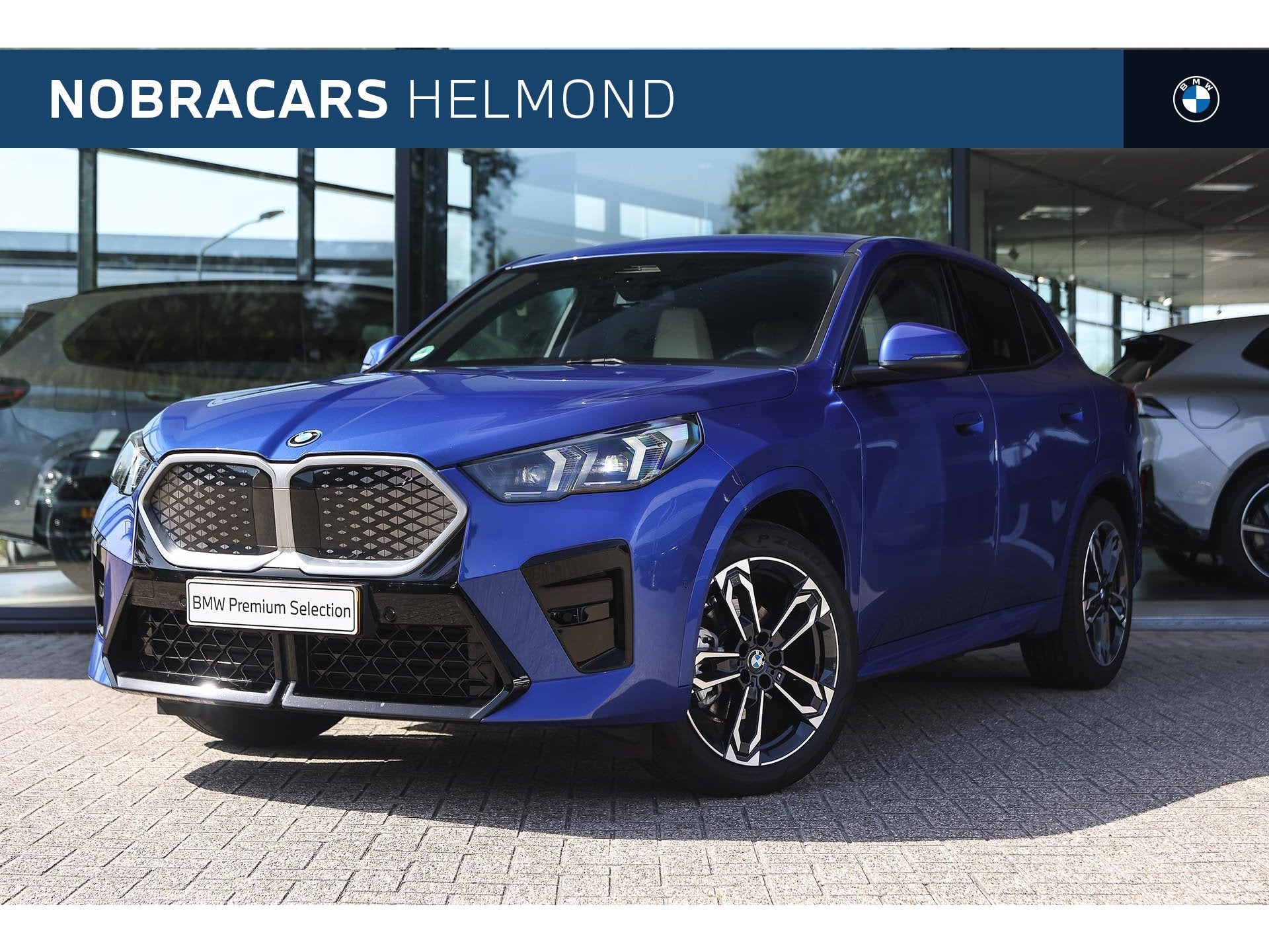 BMW iX2 eDrive20 M Sport / Sportstoelen / Achteruitrijcamera, Auto's, 750 kg, 204 pk, SUV of Terreinwagen, Te koop