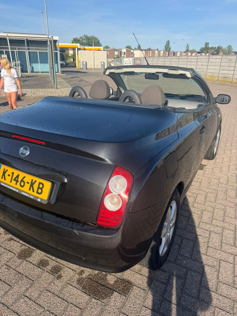 Nissan Micra 1.6 C+C 2007 Zwart, Auto's, Nissan, Bedrijf, Micra, ABS, Airbags, Airconditioning, Alarm, Bluetooth, Boordcomputer