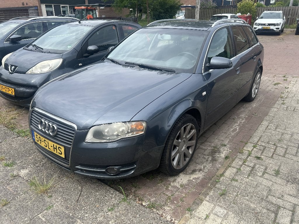 Audi A4 2.0 96KW Avant 2006 Grijs, Auto's, Audi, Voorwielaandrijving, Stof, Zwart, 4 cilinders