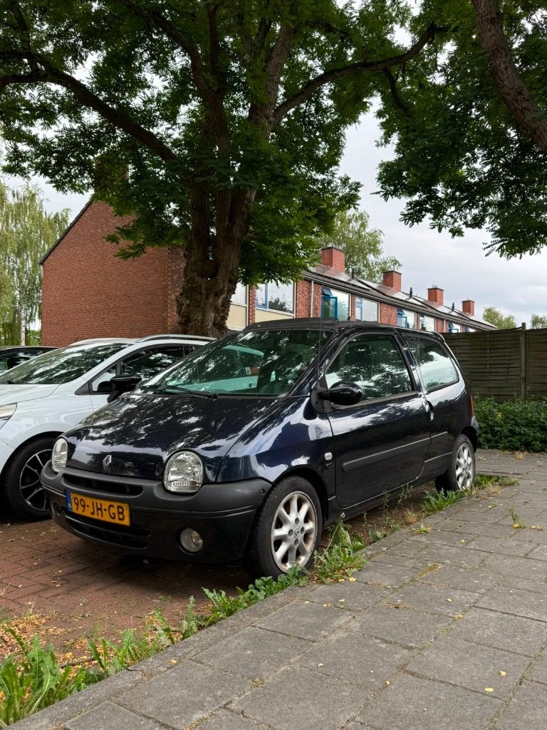 Renault Twingo 1.2 16V Initiale Blauw (Leer, pano, trekhaak), Auto's, Renault, Voorwielaandrijving, 4 cilinders, Handgeschakeld