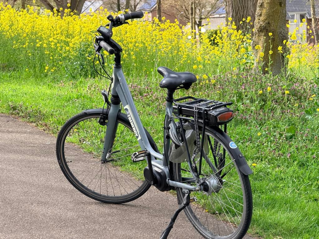 Elektrische fiets met krachtige middenmotor - Z.G.A.N., Zo goed als nieuw, 51 tot 55 cm, 50 km per accu of meer, Ophalen
