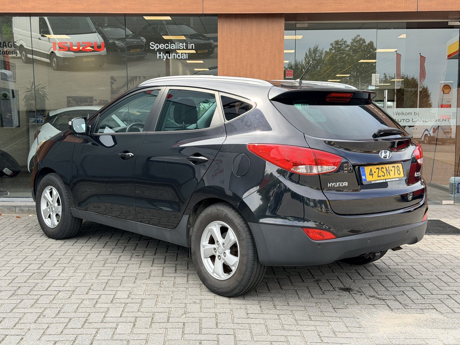 Hyundai ix35 2.0i Active | Radio | Stoel verwarming | Cruise, Gebruikt, Zwart, 4 cilinders, Leder en Stof