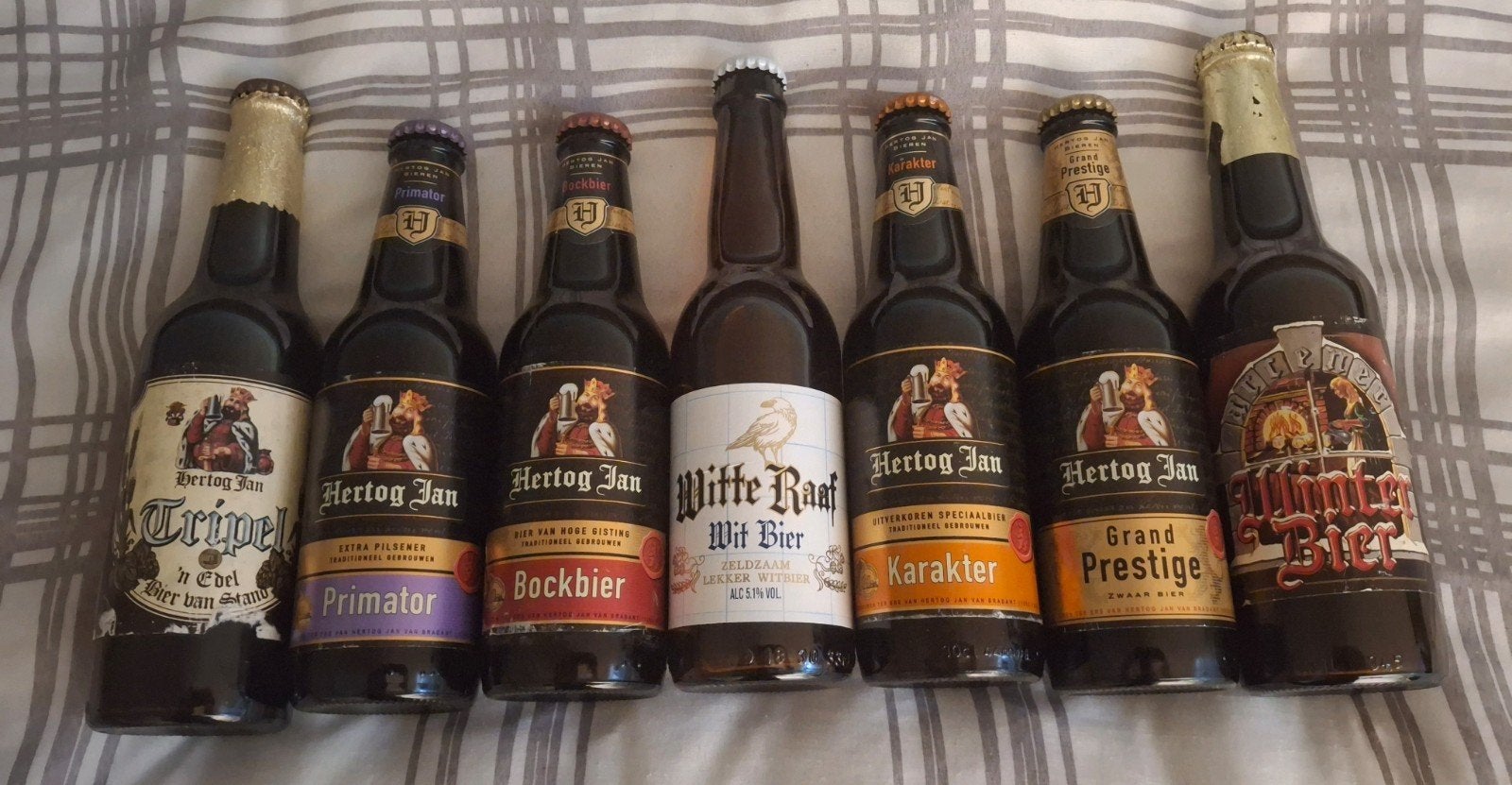 Collectie van 7 oude volle bierflessen Hertog Jan, Ophalen of Verzenden, Zo goed als nieuw, Flesje(s), Hertog Jan