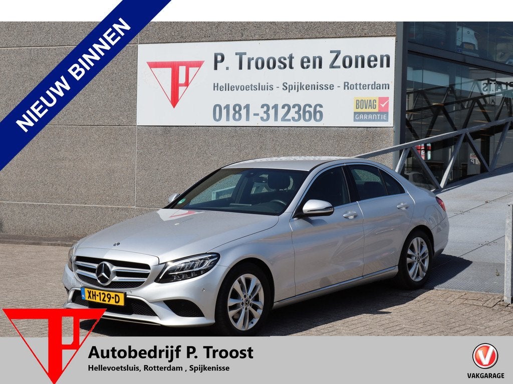 Mercedes-Benz C-Klasse 180 FACE LIFT/Orig NL/Dealeronderhoud, Auto's, Mercedes-Benz, 12 maanden, 1800 kg, Leder en Stof, Nieuw