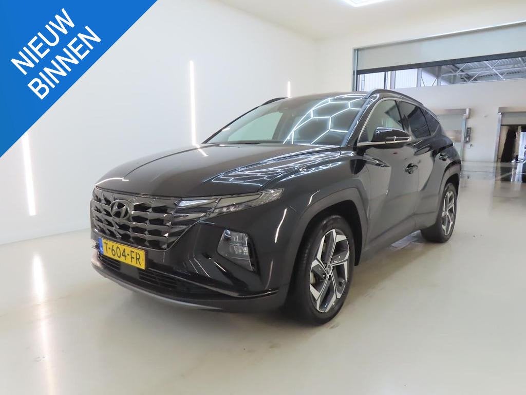 HYUNDAI TUCSON 1.6 T-GDI HEV PREMIUM I AUTOMAAT I 360 CAMERA, 4 cilinders, Met garantie (alle), 1650 kg, Zwart
