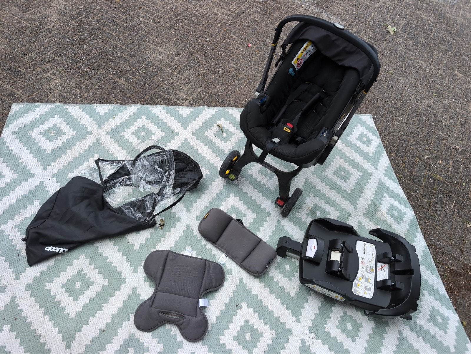 Doona+ autostoel met Isofix base en accessoires, Kinderen en Baby's, Overige merken, Autogordel of Isofix, Ophalen of Verzenden