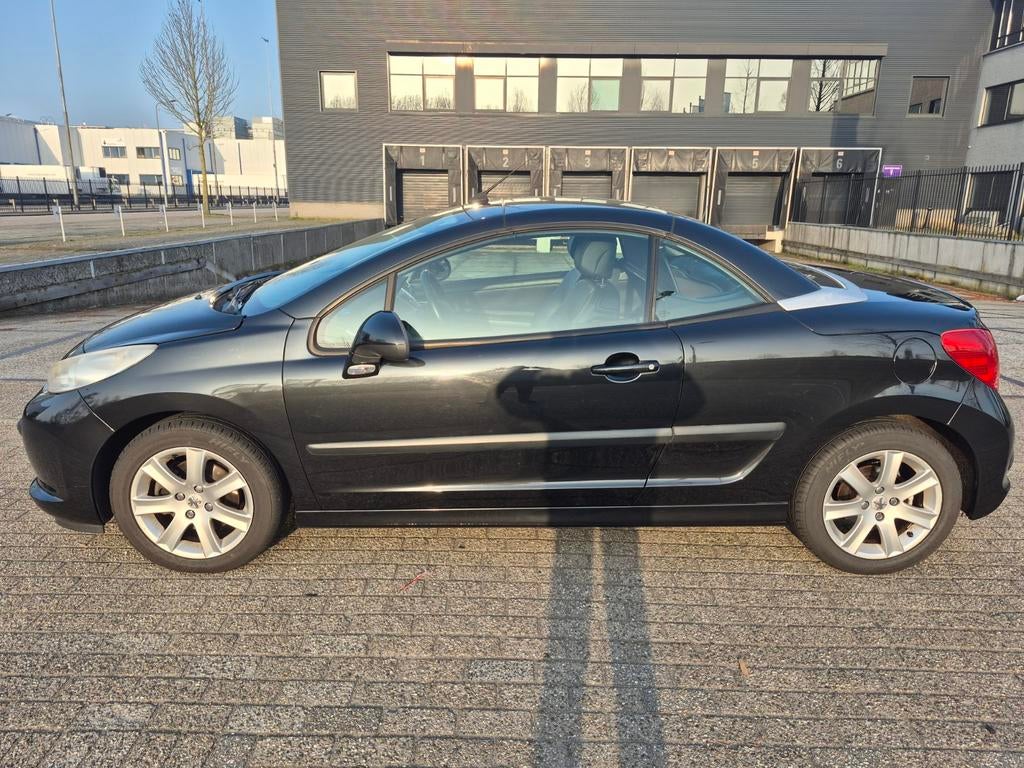 Peugeot 207 1.6 16V CC 88KW 2008 Zwart, Auto's, Peugeot, Voorwielaandrijving, 15 km/l, Zwart, 4 cilinders