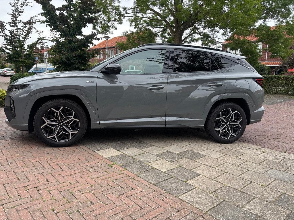 Tucson N line 1.6 T-gdi Phev 265pk AWD Aut. 2022 Grijs, Auto's, Hyundai, Automaat, 1350 kg, Zwart, 4 cilinders