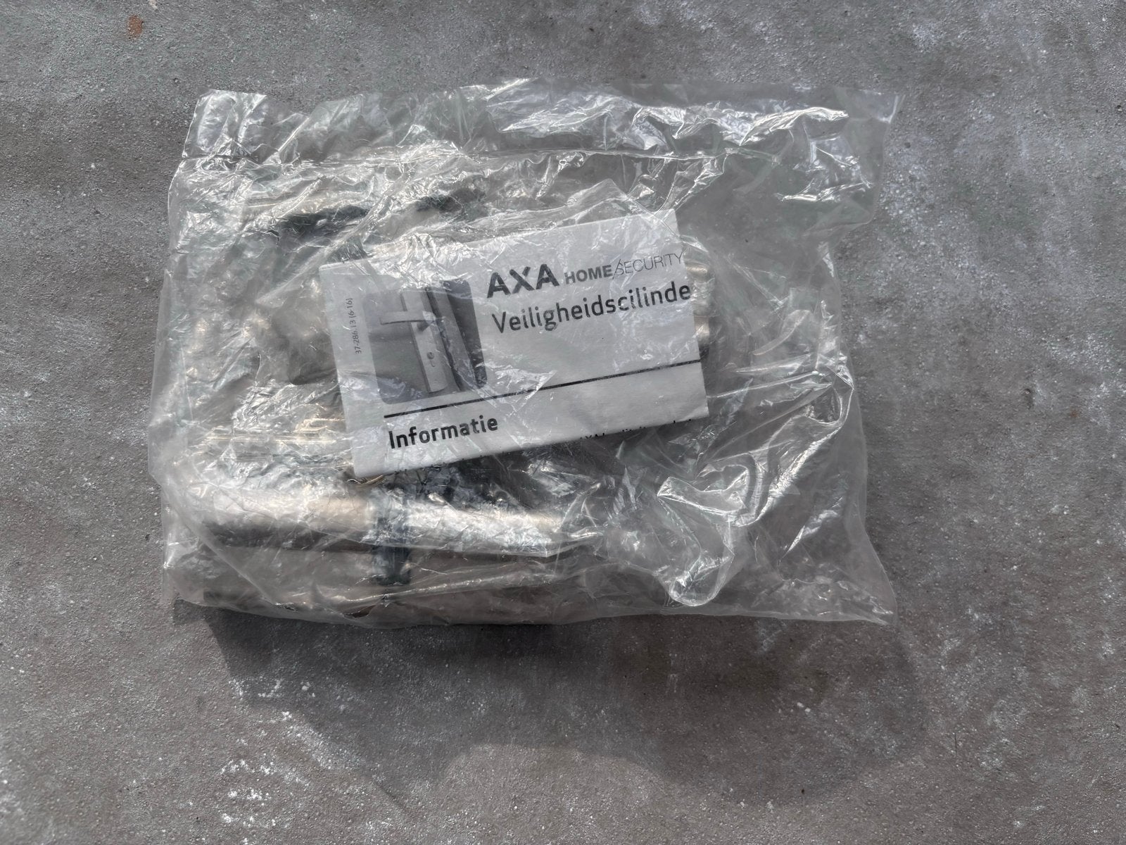 2x AXA SKG ** Veiligheidscilinders - Nieuw, Ophalen of Verzenden, Nieuw, Overige materialen, Slot
