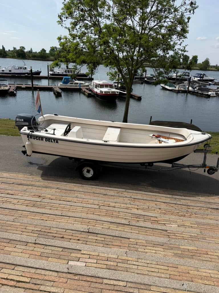 Kruger 420 selva 15pk 4 takt en trailer koopje € 2950,-, Watersport en Boten, Ophalen, Zo goed als nieuw