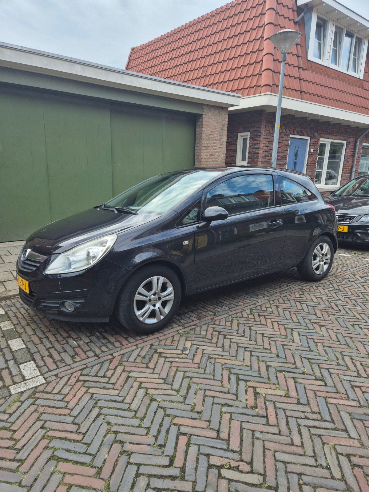 Opel Corsa 1.2 16V 3D WR 2008 Zwart nieuwe apk, 1028 kg, 1229 cc, Zwart, Particulier
