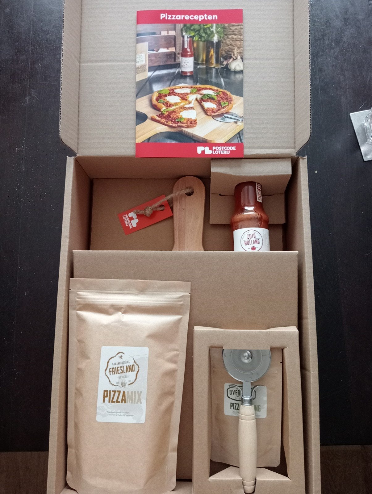 Pizza pakket Postcodeloterij, Ophalen