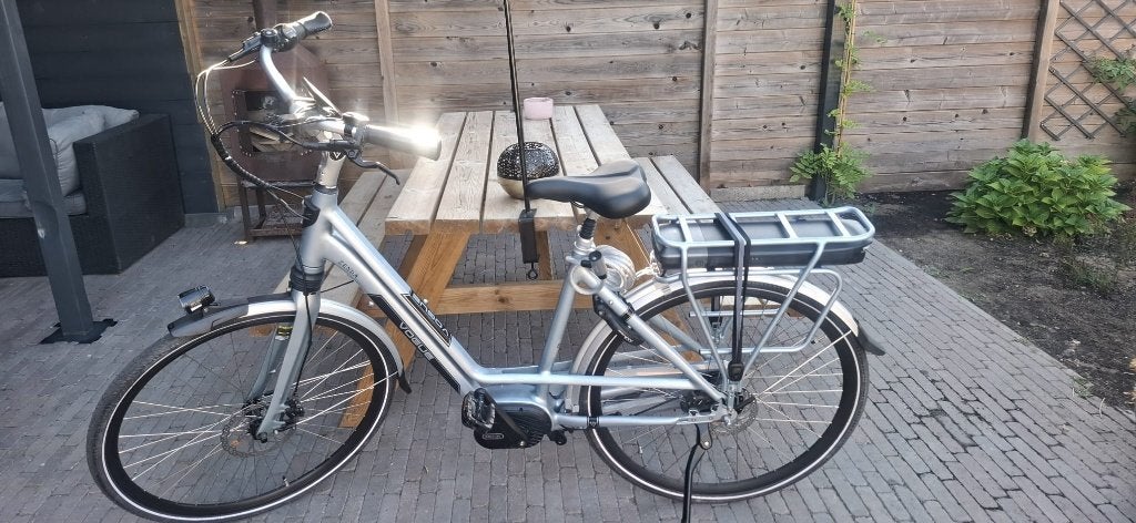 Te koop – Vogue elektrische fiets, Zo goed als nieuw, 51 tot 55 cm, 50 km per accu of meer, Ophalen