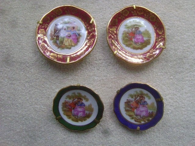 4 limoges bordjes, Ophalen of Verzenden, Gebruikt, Porselein, Bord of Schaal