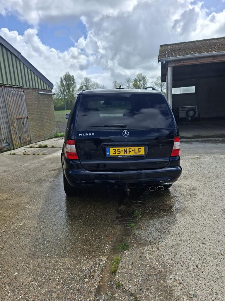 Mercedes-Benz M-Klasse 3.7 Ml350 4MATIC AUT 2003 Zwart, Auto's, Automaat, Zwart, 138 €/maand, 7 stoelen